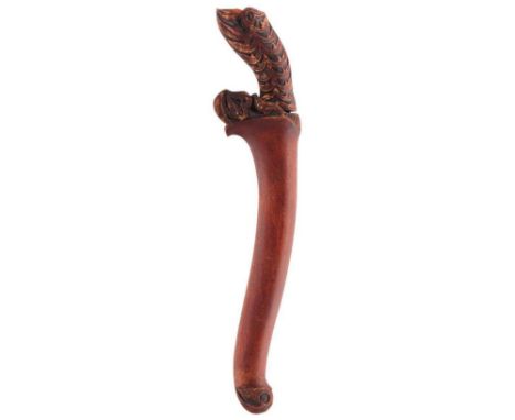 TWO 19TH CENTURY MALAY OR SUMATRAN DAGGERS, the first with 22cm curved watered blade chiselled and pierced at the forte, char