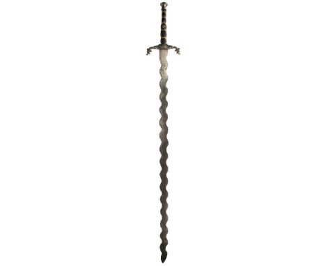 A LATE 16TH CENTURY GERMAN TWO-HANDED SWORD OR ZWEIHANDER, 141.5cm wavy blade incised a circular panel of talismanic symbols 