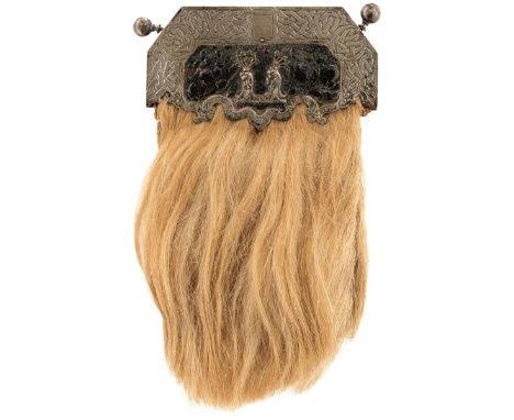 A 19TH CENTURY SCOTTISH SPORRAN, the white metal cantle finely engraved with Celtic strap work and the motto RESURGET PARS ME