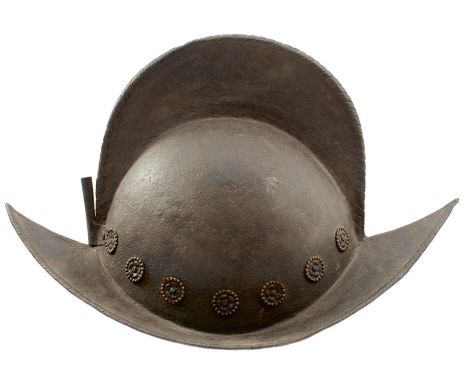 A 17TH CENTURY ITALIAN COMB MORION, two-piece skull of characteristic form with tall raised roped comb and downswept broad br