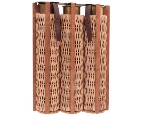 A FIRST WAR PERIOD GERMAN SHELL CASE PANNIER, for three cases, the wood and wicker body with metal lid, leather securing stra