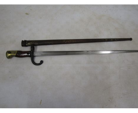 St Etienne 1879 French bayonet with inscription on blade&nbsp;Mre d'Armes de S Etienne 1879, in metal scabbard