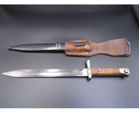 Austrian mannlicher bayonet with solid muzzle ring, CE over WG to ricasso with metal scabbard and leather frog