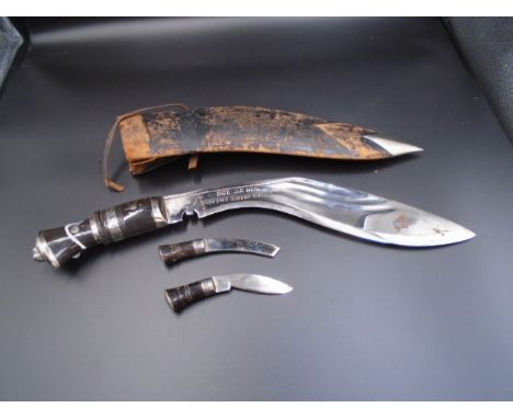 Kukri Presentation knife with scabbard and pair of skinning knifes, engraved 'SGT J P Neil 1/10 PMO Gurkha Rifles'