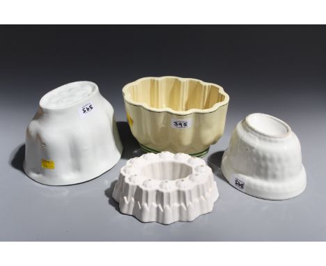 A collection of  Shelley and other antique and vintage ceramic decorative jelly moulds