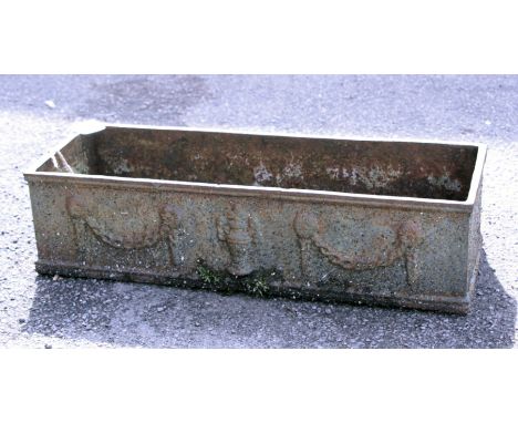 A 19th century cast iron plant trough, embossed with swags, 60cm wide
