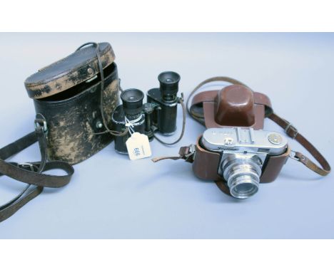 A cased pair of Voigtlander binoculars and a cased Vito 'B' camera