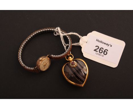 A late Victorian gold mounted banded agate pendant, with applied ruby and seed pearl cluster, together with a lady's 9ct gold