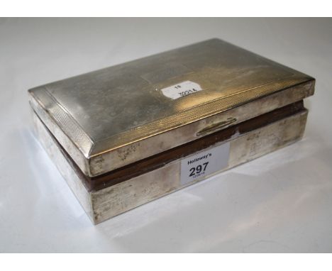 Sanders and MacKenzie, a silver cigarette box, with engine turned hinged cover and divided wood interior, Birmingham 1946, 4.