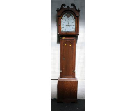 An early 19th century 8 day moonphase longcase clock, with oak case, with broken arch hood, 218cm high
