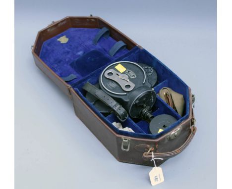 Bell and Howell Co, Chicago, a Model 70 cine camera in original fitted leather case