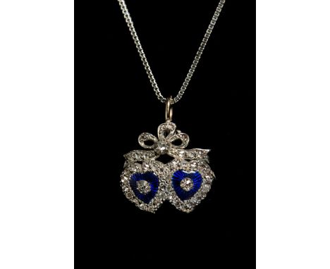 A Victorian diamond and enamel double heart-shaped pendant, the blue guilloché enamel hearts with applied central rose diamon