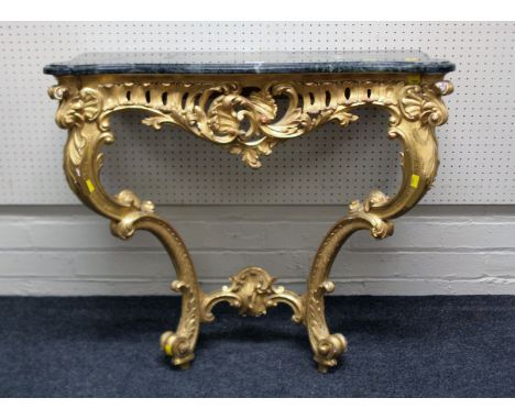 A 19th century style carved wood and gilt gesso console table with shaped marble top, 86cm wide