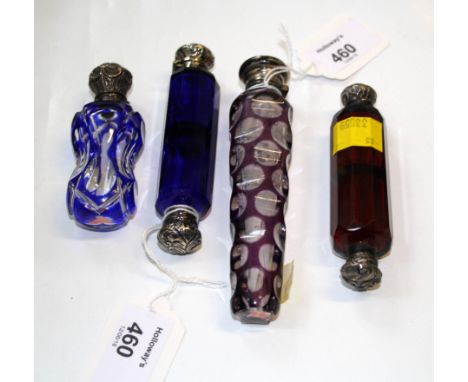 A Victorian amethyst and clear facet cut scent bottle with white metal mount, together with a Victorian ruby glass double end