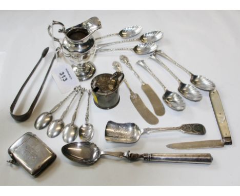 A set of six Victorian Onslow pattern teaspoons, London 1890, together with a silver sugar shovel, London 1886, a pair of sil