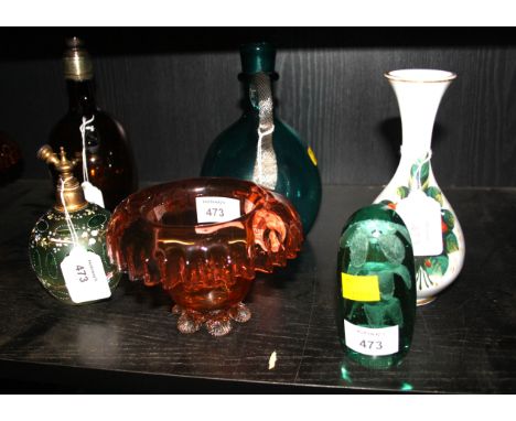 A pair of late 19th century strawberry tinted glass posy vases, each with inverted rim on shell moulded clear feet, together 