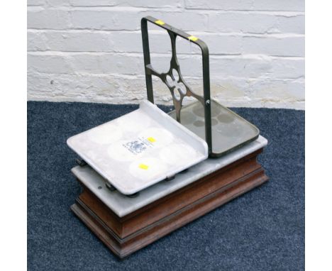 A set of W & T Avery of Birmingham counter top vintage balance scales, with porcelain panel and oak and marble base