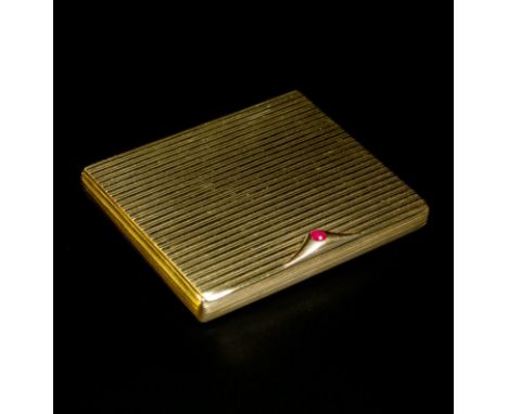 A 9ct gold compact, rounded rectangular with reeded bands to cover, sides and base, circular cabochon ruby to elongated trian