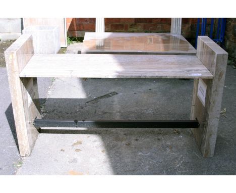 An Italian travertine mottled caramel grey console table, the rectangular top on block end supports united by a cast metal st