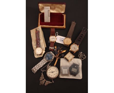 A silver plated engine turned Dunhill lighter, in fitted case, together with a quantity of wristwatches and costume jewellery