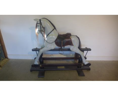 A rocking horse by The Casterbridge Rocking Horse Company 2007 - serial number 005 of 100 - in good condition, standing 125cm