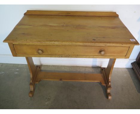 A small 19th century pine side table with single drawer, structurally sound but with split to top, approx 90cm W x 78cm H ove