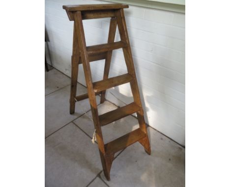 A 4-tread pine step ladder, stripped and waxed - 122cm long 