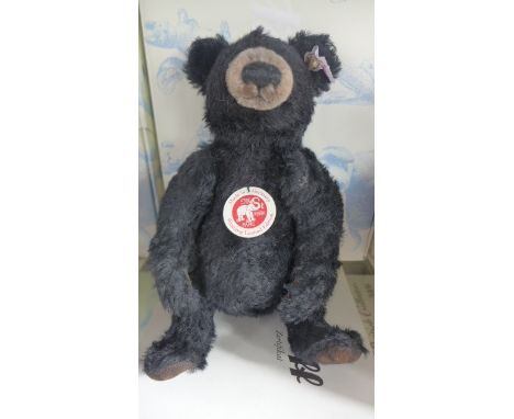 A Steiff Winnipeg the Bear Cub - 23cm, Mohair - limited edition, number 1085 of 1500 with certificate and original box, in go