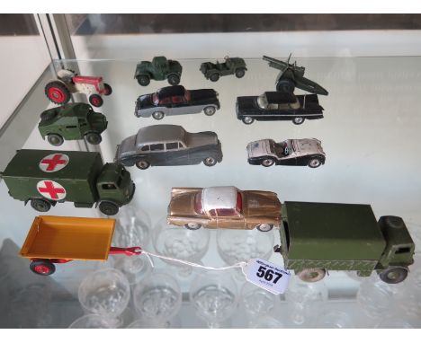 A collection of Dinky and Corgi die-cast model vehicles including five military vehicles, a Corgi tractor with trailer, twelv