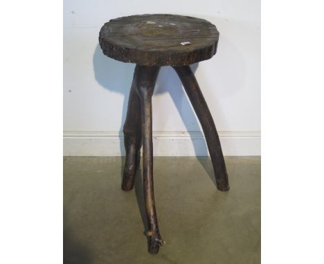 A rustic side table - 76cm H x 45cm diameter 