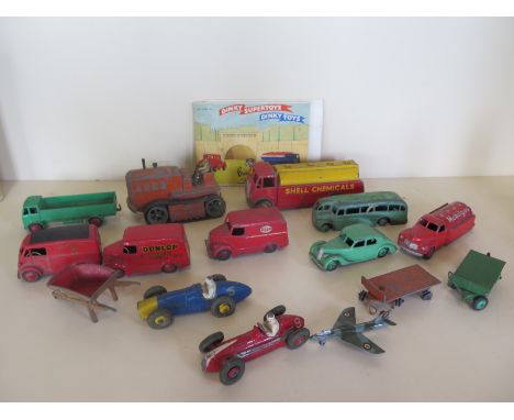 Twelve Dinky Toys die cast model, commercial vehicles racing cars, and other models, including a Dunlop Trojan van,  a 234 Fe