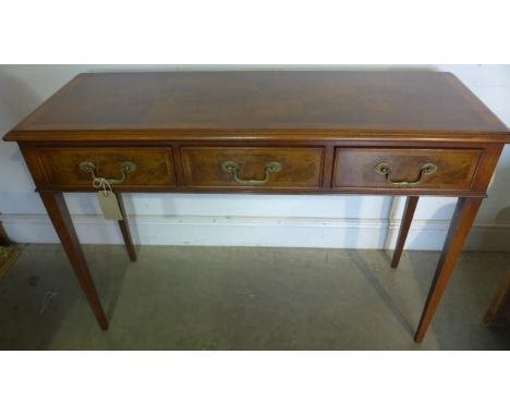 A walnut side table with three drawers - 115cm W x 42cm D x 76cm H - made by a local craftsman to a high standard 