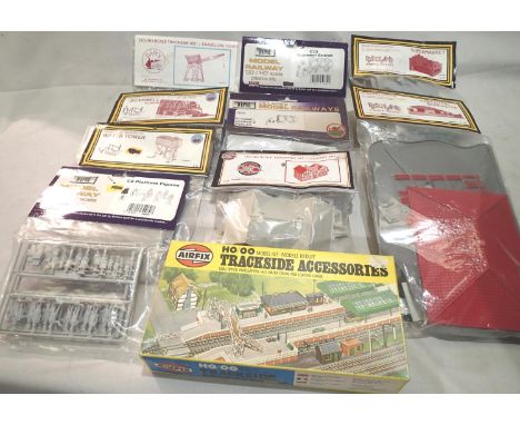 Ten Dapol/Airfix railway assorted kits including water tower, crane, country inn, supermarket, bungalow, scarmell scarab, all