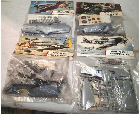 Four early Airfix bagged aircraft kits, Spitfire, Thunderbolt, Typhoon, Hurricane, appear complete/unchecked. UK P&amp;P Grou