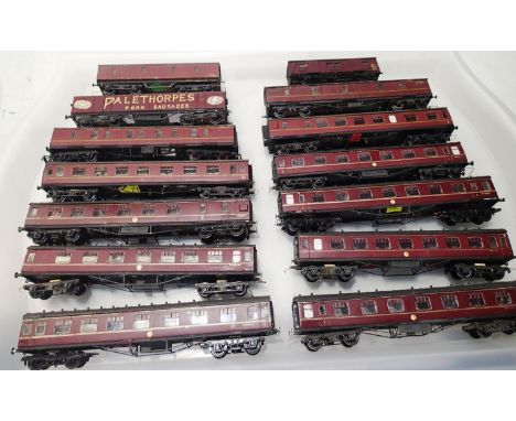Fourteen TT gauge kit built coaches, G.U.Vs etc, fair to good build and finish. UK P&amp;P Group 1 (£16+VAT for the first lot
