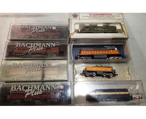 Three N gauge American Outline locomotives, Southern Pacific SD40, Union Pacific tender, Union Pacific and Monon diesels, plu