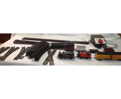 Triang OO scale comprising of 0.6.0 Jinty, 0.4.0 Shunter and five wagons plus selection of track, three points, crossover, tw