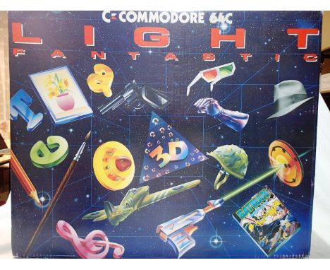 Commodore 64c light fantastic edition, appears as new/unused, box has slight storage wear. UK P&amp;P Group 1 (£16+VAT for th