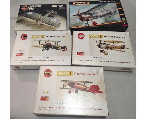 Five 1/72 scale Bi plane aircraft kits, Airfix Sopwith Pup, Albatross, Sopwith camel and Matchbox Gloster Gladiator, all appe