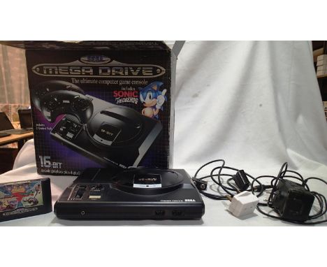 Sega Mega Drive console and power pack plus one game, no controllers. UK P&amp;P Group 1 (£16+VAT for the first lot and £2+VA