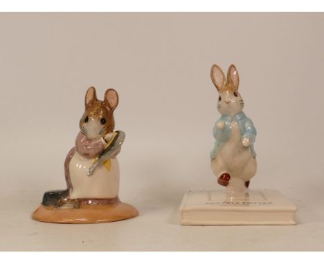 Beswick Beatrix potter figures to include Peter on his book P4217 and Hunca Munca . Boxed 