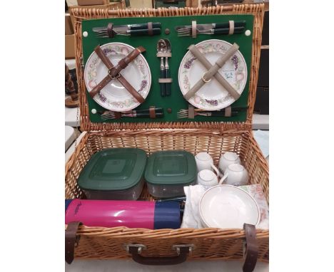 Vintage wicker picnic hamper and contents. 
