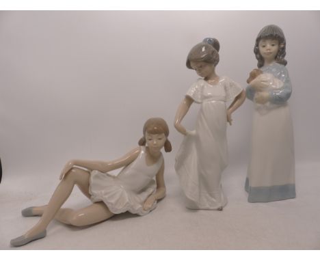 Three Nao Figures to include Girl with Puppy, Reclining Ballerina and Girl in Flowing Dress. (3) 