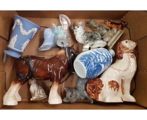 A mixed collection of ceramic items to include a Nao figure of a girl, Wedgwood blue jasperware vase, Beswick small Dachshund