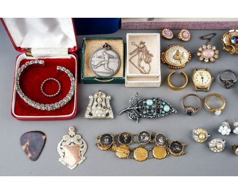 A collection of costume, including brooches, earrings, faux pearls, Art Deco, football medals, marcasite etc, and two Rotary 