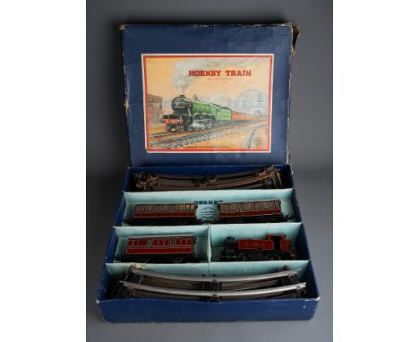 A vintage boxed Hornby Train clockwork 0 guage no 101 Tank Passenger Set made by Meccano Ltd Liverpool, LMS engine 2270 , red
