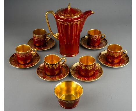 A vintage Crown Devon lustre and gilt pattern no 699 coffee service including coffee pot, six cans, six saucers and a sugar b