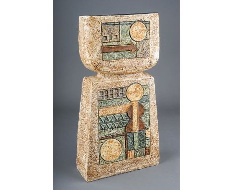 A Troika Pottery double base vase, cast in low relief with geometric panels in shades of ivory and green, painted factory mar