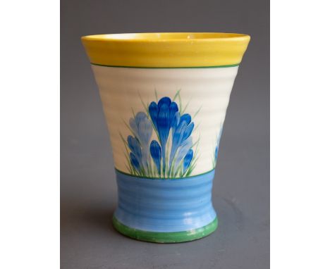 A Clarice Cliff "Crocus" pattern vase, the tapering body painted with blue crocuses, yellow border, stamped  Crocus  Bizarre 