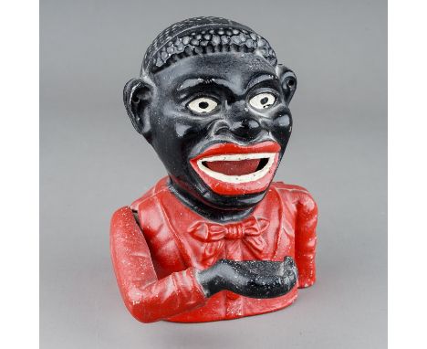 A vintage cast "Little Joe" iron money box Notice from the the-saleroom.com: These items are listed on the basis they are ill